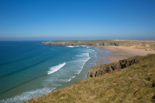 istock Holywell North Cornwall with waves beach and coast on a beautiful day 1152830618