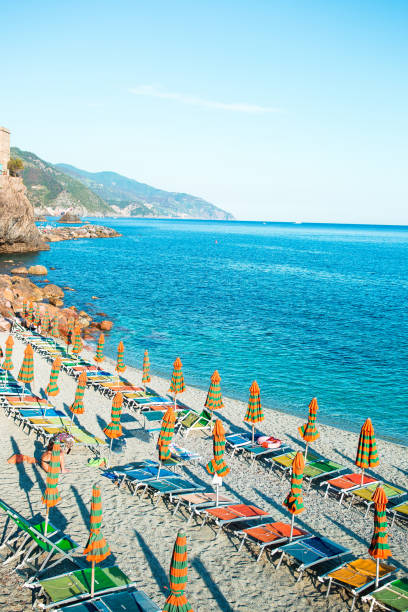 istock Empty beach with closed umbrellas on italian coast 1152830718