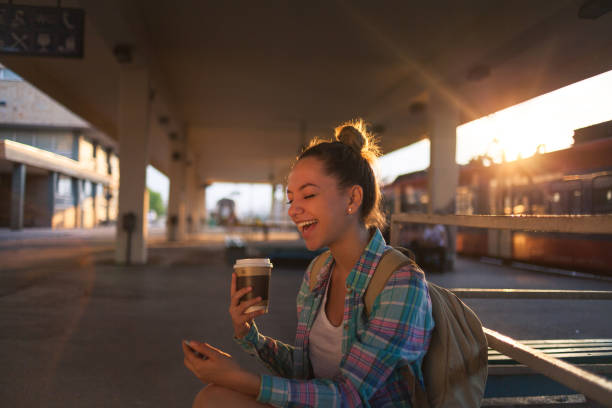 istock Surfing the net on train station 1152830951