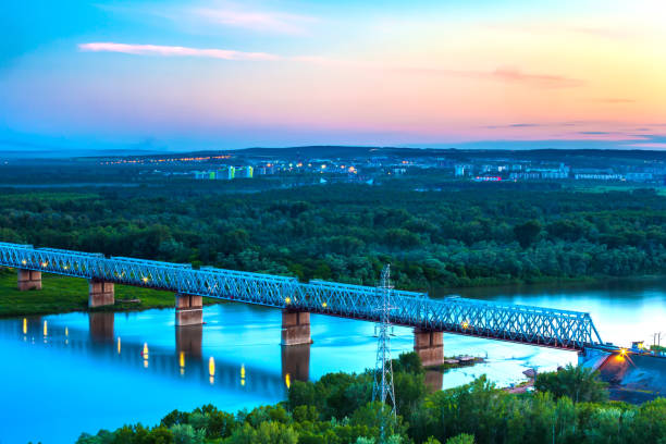 закат над уфой, башкортостан, россия. - architecture blue bridge iron стоковые фото и изображения
