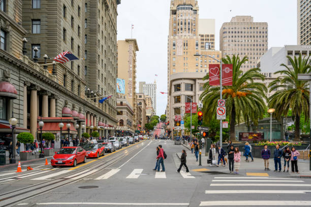 People crossing the street at Union Square and in central San Francisco, California, United States.