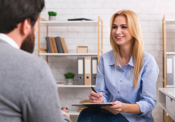 istock Psychologist having session with patient in office 1152836750