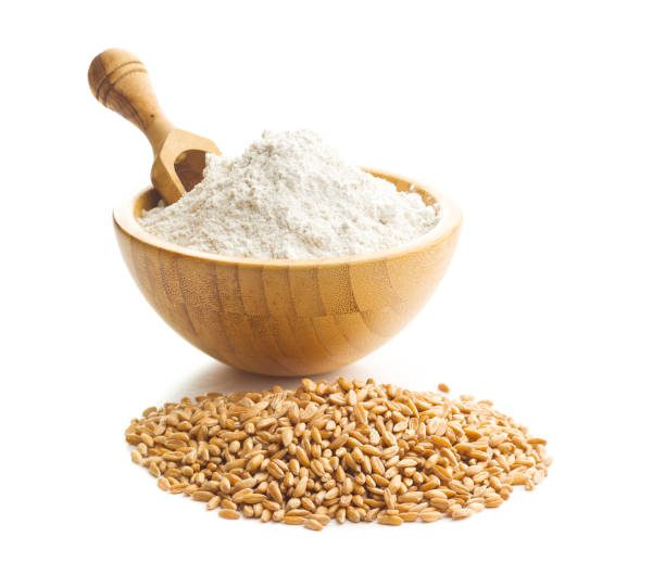 istock Whole grain wheat flour and wheat grains. 1152837666