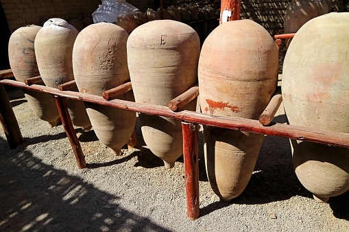 Row of Amphoras Used in the Production of Peruvian Pisco Brandy at the Winery in Ica Region, Peru, South America