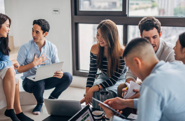 istock Group of millennials working together on new project 1152839736