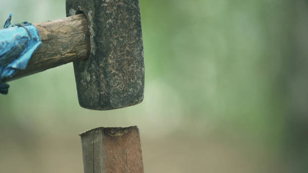 Garden DIY. Using hammer