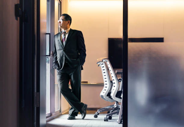 istock Thoughtful male professional in board room 1152842552