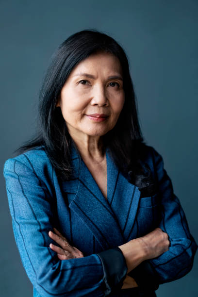 istock Confident female executive with arms crossed 1152842715