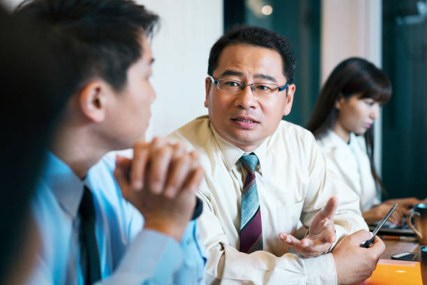 istock Entrepreneur explaining business plan to colleague 1152842991