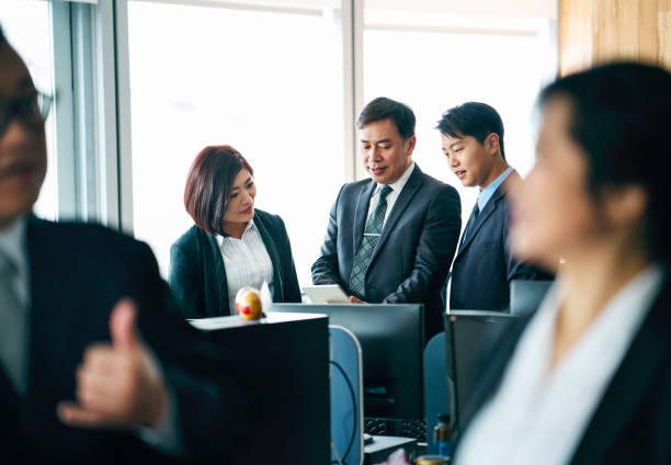istock Entrepreneurs discussing over digital tablet 1152843240