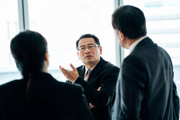 istock Serious executives having meeting in office 1152843432