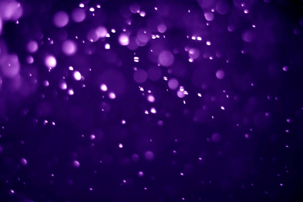 istock Bokeh purple proton background abstract 1152844746