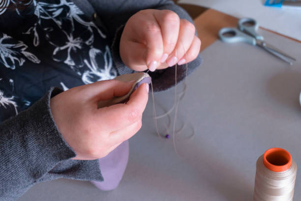 istock Woman making handmade jewellery 1152850030