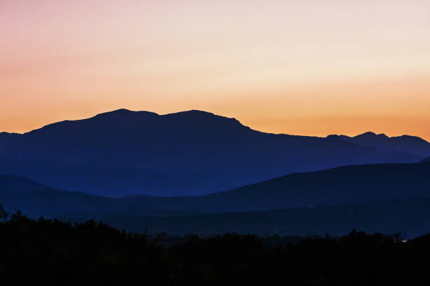 istock Dramatic orange sunset over the mountain and the Mediterranean Sea 1152853453
