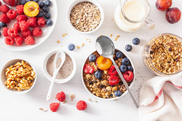 istock healthy granola for breakfast with berry fruit nut, vegan milk 1152854508