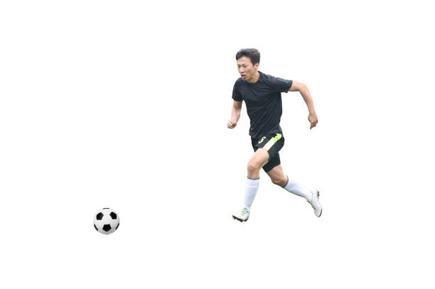 Asian adult man playing soccer isolated on white background
