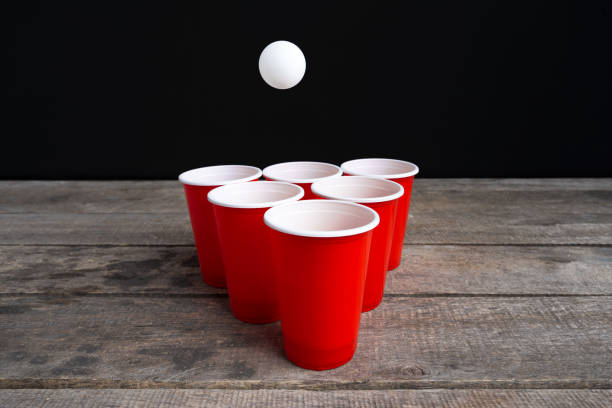 istock Game Beer Pong on wooden table 1152858714