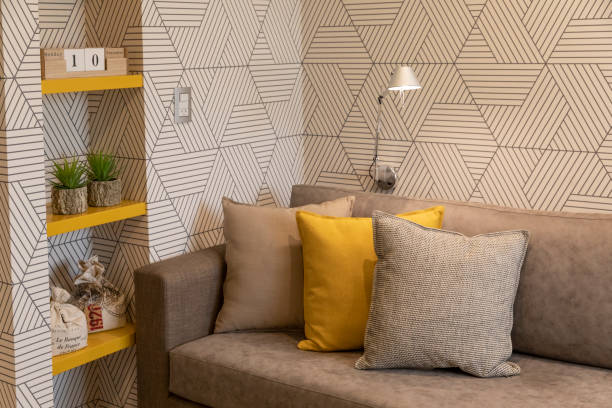 istock sofa with cushions and a lamp 1152859694