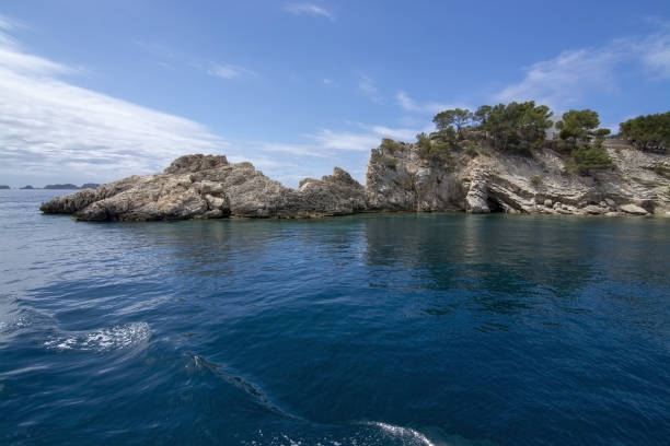 Pretty Buildings Cala Fornells Sea Majorca SANTA PONSA, MALLORCA, SPAIN - MAY 29, 2019: Pretty buildings in Cala Fornells from sea on May 29, 2019 in Santa Ponsa, Mallorca, Spain. seaside views of cala fornells mallorca stock pictures, royalty-free photos & images