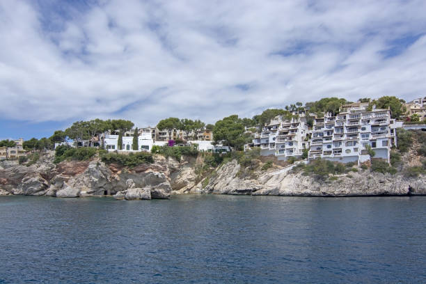Pretty Buildings Cala Fornells Sea Majorca SANTA PONSA, MALLORCA, SPAIN - MAY 29, 2019: Pretty buildings in Cala Fornells from sea on May 29, 2019 in Santa Ponsa, Mallorca, Spain. seaside views of cala fornells mallorca stock pictures, royalty-free photos & images