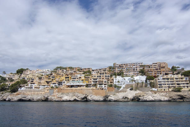 Pretty Buildings Cala Fornells Sea Majorca SANTA PONSA, MALLORCA, SPAIN - MAY 29, 2019: Pretty buildings in Cala Fornells from sea on May 29, 2019 in Santa Ponsa, Mallorca, Spain. seaside views of cala fornells mallorca stock pictures, royalty-free photos & images