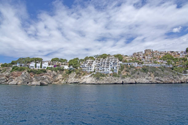 Pretty Buildings Cala Fornells Sea Majorca SANTA PONSA, MALLORCA, SPAIN - MAY 29, 2019: Pretty buildings in Cala Fornells from sea on May 29, 2019 in Santa Ponsa, Mallorca, Spain. seaside views of cala fornells mallorca stock pictures, royalty-free photos & images