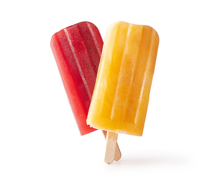 Bitten orange fruit popsicle isolated on white background. Orange, mango and peach flavor