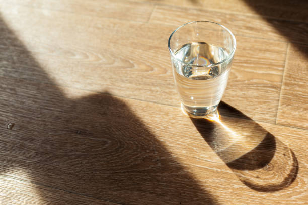 istock Glass of water on table 1152862630