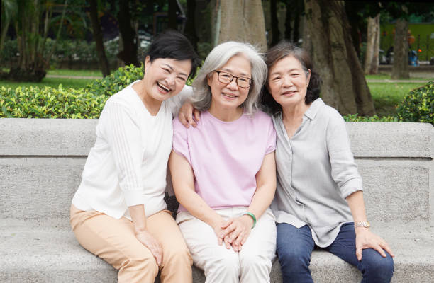 istock Senior ladies gathering in the park 1152864128