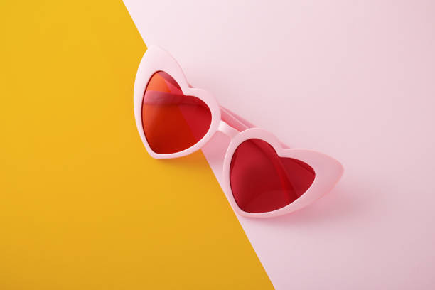 istock Heart shaped glasses on two tone background 1152865779