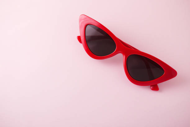 istock Red retro sunglasses on pink background 1152865839
