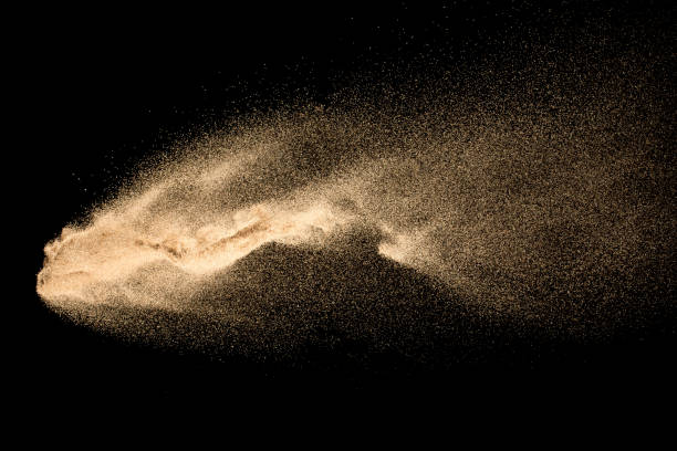 istock Dry river sand explosion isolated on black background. Abstract sand cloud.Brown colored sand splash against dark background. 1152867405