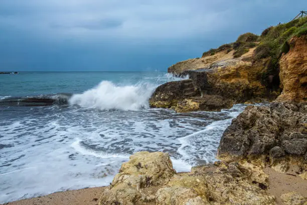 Photo of Strormy sea coast near Porto Torres, province of Sassari , Sardinia, Italy.