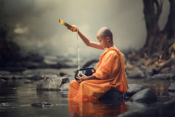 Novice Monks Thailand ,Buddhist Temple,Novice Monk Depicting a Religious Faith in a Temple in Thailand.