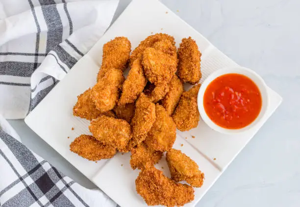 Chicken Nuggets with Ketchup, Popular American Fast Food, Snack, Quick Bites, Appetizer, Directly Above Photo.