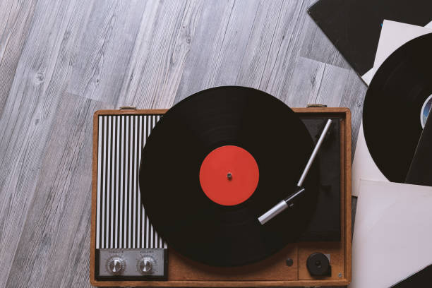 istock Vintage turntable with a vinyl record 1152871535