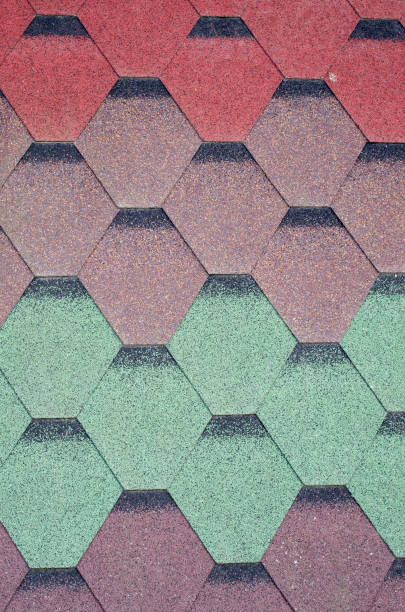 istock New modern bitumen colorful  shingle samples closeup 1152874221