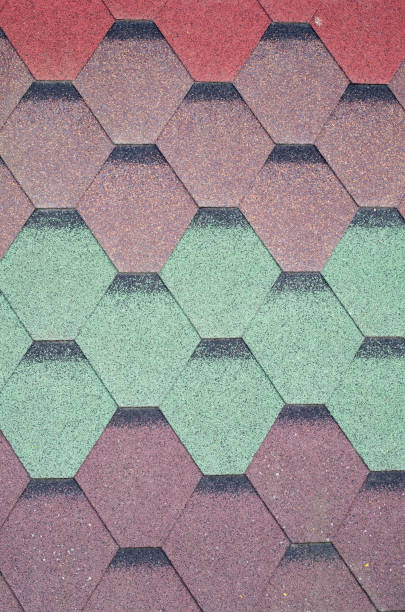 istock New modern bitumen colorful  shingle samples closeup 1152874249