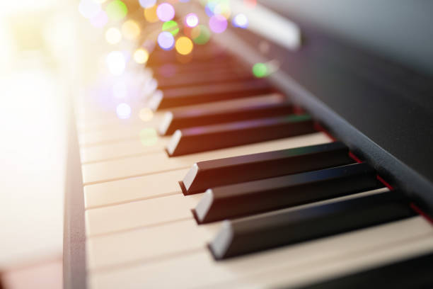 istock piano keys and playing piano 1152875488