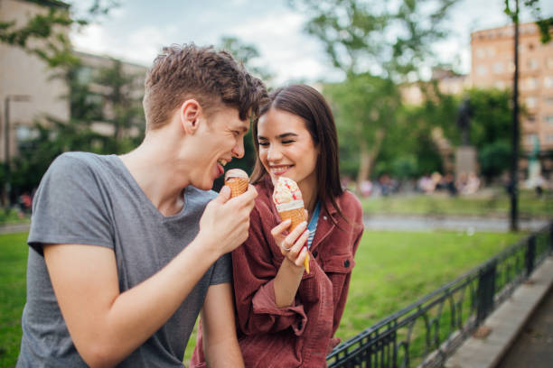 istock Couple in love having ice cream 1152875516
