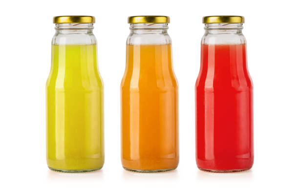 istock Juice glass bottle isolated 1152875748