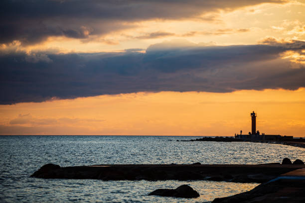 istock clear sky with dramatic clouds over the lake in sunset 1152879969