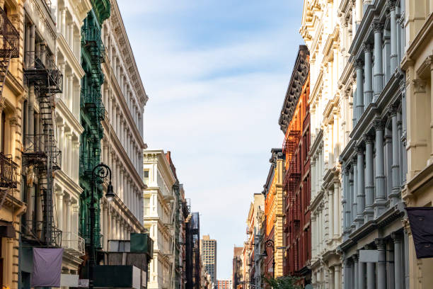 Historic buildings on Greene Street in the SoHo neighborhood of Manhattan in New York City Historic buildings on Greene Street in the SoHo neighborhood of Manhattan in New York City NYC soho new york stock pictures, royalty-free photos & images