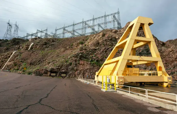 Arizona's Parker dam with power lines and gantry.