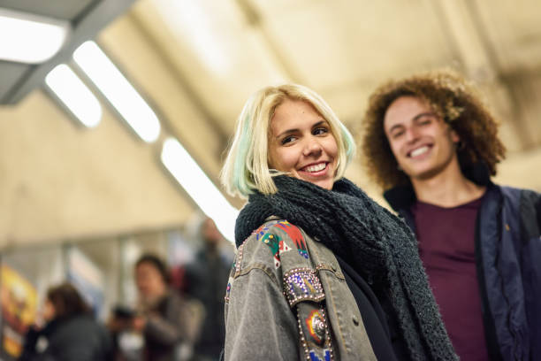istock Young couple going upstairs at a subway station. 1152882938