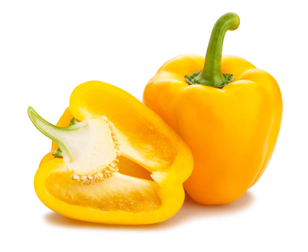 yellow bell pepper sliced yellow bell pepper path isolated on white two objects vegetable seed ripe stock pictures, royalty-free photos & images