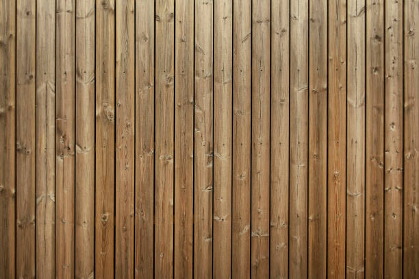 istock Old brown wooden fence background texture 1152887299
