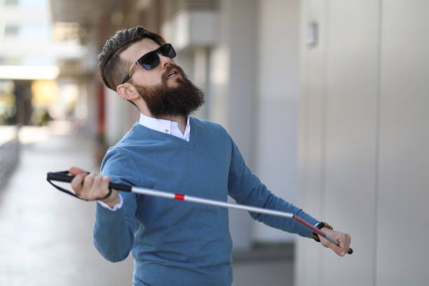 Closeup rear view of a young man hitting a driver shot.