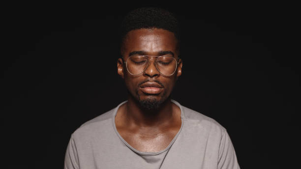 istock African man with eyes closed 1152890668