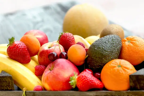 Photo of Fresh fruit, organic fruits close-up on rustic table